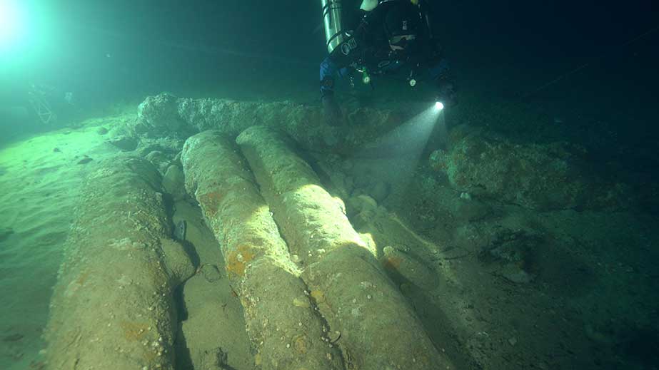 Dive crew find cannons on the seabed at the F35 slave wreck site in the English Channel, UK.