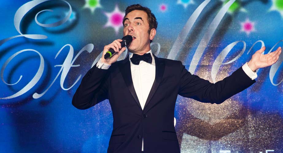 James Nesbitt on stage hosting an awards ceremony