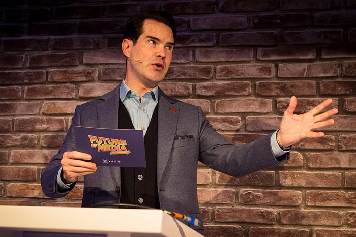 Jimmy Carr hosting a corporate game show panel