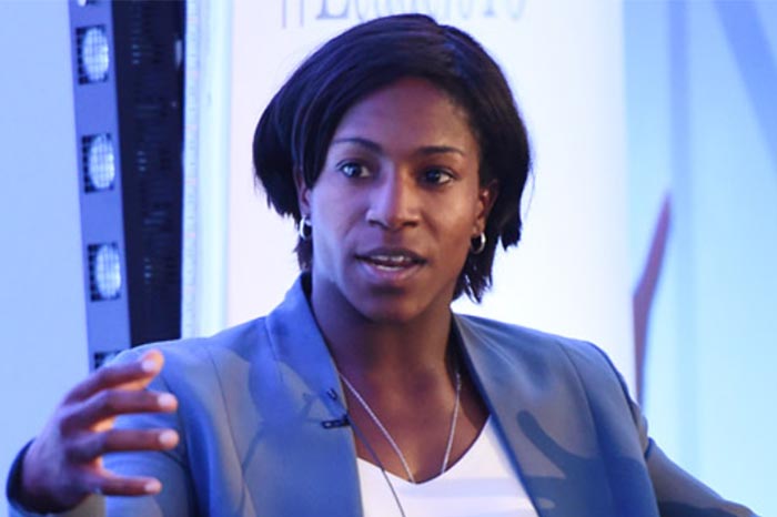Maggie Alphonsi, empowering keynote speaker and former rugby player delivering a motivational speech
